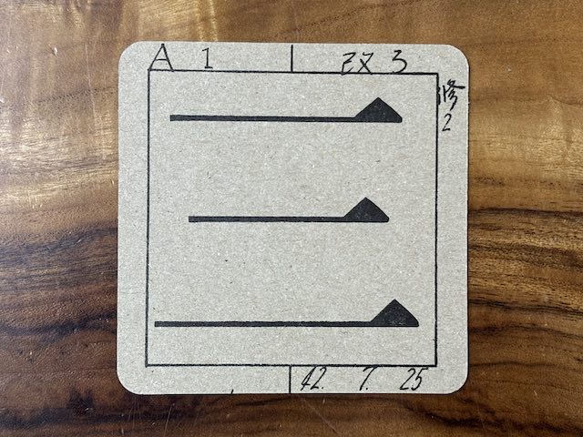 常設展示解説ツアーでもらった活字の原図をもとにしたコースター